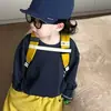 Roupa infantil 2026 outono novo estilo meninos estilo coreano simples e estilosa blusa de moletom de manga comprida com calça estilosa com letras da moda
