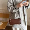 Bolso de hombro retro, moderno, nueva colección otoño 2026, bolso cruzado simple tipo dumpling, estilo coreano, alto valor estético, bolso de hombro para mujer
