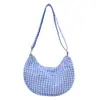 La nueva bolsa de esta temporada, minimalista y elegante, con forma de dumpling, presenta un diseño moderno y único de inspiración coreana, perfecta para salidas al aire libre y como bolso de hombro.