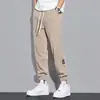 Calça jogger clássica, simples, versátil e casual para outono e inverno masculino; calças esportivas de veludo cotelê modernas e de corte solto para jovens