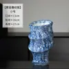 Jarrón de cerámica de forma irregular con esmalte de copo de nieve azul y blanco, estilo chino nuevo, recipiente floral de alta gama para sala de estar y entrada, adorno artístico Zen de estilo nacional