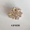 Pinza para el pelo exagerada de nicho europeo y americano de aleación de caracola para mujer, Pinza de pelo de estrella de mar de moda, Pinza de tiburón, Accesorio para el pelo simple y elegante