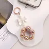 Nuevo Colgante Llavero de Coche con Lazo de Perlas Acrílicas Anillo de Color Caramelo Accesorios de Perla Decoración de Bolso