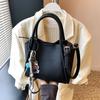 Bolso de Cubo Simple con Doble Hebilla Nuevo de Primavera 2025 para Mujer, Bolso Cruzado Niche Texturizado de Color Sólido, Bolso de Mano Moderno y Elegante