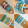 Conjunto de pulseiras de férias estilo boêmio transfronteiriço europeu e americano, pulseira multicamadas com sementes, concha e estrela-do-mar