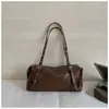 Bolsa de axila retrô de nicho de alta qualidade transfronteiriça bolsa feminina nova versão coreana bolsa de ombro casual para o dia a dia bolsa Boston