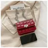Cadena Cuadriculada en Relieve 2025 Nuevo Estilo Coreano Hebilla de Candado Diseño de Color Sólido Textura de Cadena Bolso Cuadrado Pequeño de Hombro Cruzado para Mujer