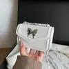 Mini mariposa metálica con patrón de lichi 2026 verano nueva moda cadena elegante versátil hombro bandolera bolso cuadrado pequeño