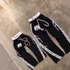 Ebay Transfronterizo Retro Hip-Hop Punk Ins Export Carta Impresión Digital Pantalones Deportivos Pantalones Deporte Hombres y Mujeres Venta al por Mayor