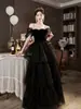 Vestido de Noche Un Hombro Negro 2026 Nuevo Francés Lujo Ligero Nicho Gama Alta Presentador/MC Sentido de Gama Alta Vestido de Ceremonia para Adultos