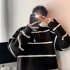 Suéter de felpa suave para hombre Otoño e Invierno Marca de moda coreana Chaqueta de alta gama Estilo perezoso americano Suéter de punto a rayas