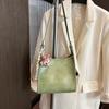 Bolsa de viagem com design de nicho simples para mulheres, nova moda primavera 2025, bolsa transversal de ombro retrô para mulheres