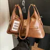 Bolso de Hombro Individual Retro de Nicho Coreano para Mujer 2026 Nuevo Bolso Tote de Gran Capacidad para el Trabajo con Acabado de Alta Gama y Diseño Cruzado