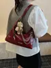 Bolso cruzado de axila minimalista suave color marrón de moda para este año, para el trabajo y los desplazamientos, nuevo estilo 2025, bolso pequeño versátil y a la moda