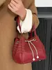 Bolsa Saco 2026 Novo Modelo Bolsa Feminina Primavera Ombro Bolsa de Mão Estilosa Versátil para o Dia a Dia Bolsa Transversal