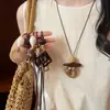 Nuevo Collar Colgante de Resina Estilo Étnico Chino Marrón Retro para Mujer Lanyard Cadena de Clavícula Accesorios Nuevo Estilo 2026