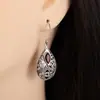 Brincos Pingente de Metal Vazado Ruby Criativo Retrô Europeus e Americanos Mais Vendidos Transfronteiriços Moda Feminina Festa Brincos Atacado