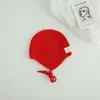 Bonitos y adorables gorros de otoño e invierno para niños, con diseño de poner, material de punto y una serie de dibujos animados, que brindan abrigo y protección para los oídos para bebés y niños pequeños.