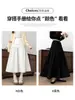 Design estilo coreano, saia midi de tricô patchwork nicho para mulheres, nova coleção outono/inverno, corte justo, valoriza a silhueta, versátil e moderna saia longa
