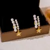 Brincos de Estilo Ins Estrela de Cinco Pontas com Zircônia Dupla Fileira de Pérolas Moda Elegante Luxo Acessível Brincos de Design Elegante de Nicho para Mulheres