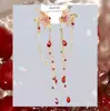 Pendientes de Fuegos Artificiales de Circonita Roja de Año Nuevo para Mujer 2026 Nuevo Estilo Popular Pendientes Únicos y Hermosos