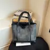 Bolsa de ombro tote feminina de grande capacidade, cor sólida, nova coleção de verão 2026, estilo vintage casual, para estudantes universitários, para ir para a aula