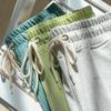 Pantalones cortos de cinco puntos para hombre Pantalones cortos deportivos de rizo Pantalones de chándal casuales de moda para hombre y mujer Pantalones rectos versátiles de verano