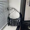 Bolsa única com pregas na axila, nova coleção outono 2026, bolsa de ombro elegante e de alta qualidade em cor sólida com um design distinto