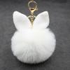 Adornos de peluche orejas de conejo lindas bola de pelo llavero imitación piel colgante de bolsa orejas de resorte accesorios de bola de pelo