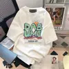 Venta al por mayor del fabricante Comercio exterior Estilo de pareja de verano Versátil Simple Dibujos animados Estampado de letras Top casual Nuevo Mangas tres cuartos