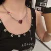 Collar de Corazón Rojo Transfronterizo Europeo y Americano Estilo Punk Cadena para Clavícula con Borla de Estrella de Cuatro Puntas Joyería de Cadena para Clavícula Personalizada