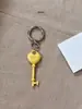 Colgante de Cabeza de Llave Igual de Blogger Ins Coreano Candado de Corazón Dorado Llavero Colgante de Bolsa Llavero de Pareja