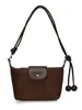 Bolso de axila de estilo francés de nicho transfronterizo para mujer, nuevo bolso de moda tipo albóndiga de gamuza para el trabajo, bolso de hombro y cruzado casual