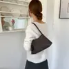 Textura Francesa Lujo Ligero Patrón Tejido Bolso de Axila Mujer 2026 Nuevo Estilo Elegante Bolso de Mano Hombro Bolso Baguette para Viaje