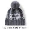 Nova coleção outono e inverno: gorro de tricô simples e versátil com pompom, feito de cashmere, apresentando um design color-block com um pequeno motivo de veado, oferecendo um visual moderno, casual e quente