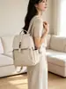 Mochila de mujer con estampado vintage nuevo, de alta gama, con tapa abatible y hebilla de cierre, adecuada para ir al trabajo y viajar, versátil mochila escolar de gran capacidad