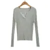 T397-26 Otoño estilo francés de alta gama cuello pico pequeño liso básico acanalado ajuste ceñido manga larga suéter de punto