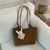 Bolsa Tote Transfronteriza de Gran Capacidad para Mujer 2026 Verano Nuevo Estilo Bolso de Hombro Bolso de Mano de Alta Gama Casual para Viajes y Uso Diario