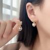 Brincos de Pérola com Diamante Inlaid de Laço Coreano para Mulheres Temperamento Coreano Celebridade da Internet Joia de Orelha Versátil para o Dia a Dia Brincos para Revenda