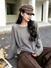 Lana fina cálida hebilla cuello redondo simple generoso manga larga versátil para mujer otoño e invierno estilo perezoso temperamento prenda interior