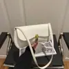 Bolsa Coreana de Nicho de Alto Valor Estilosa 2025 Nova Bolsa Feminina Moda Bolsa de Ombro Simples Bolsa Retrô de Axila para Mulheres