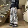 Pantalones casuales para hombre de corte holgado y pierna recta, modernos y versátiles, de pana, adecuados para primavera y otoño, con un diseño fluido de pierna ancha, estilo americano