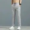 ¡Guau! Pantalones Rectos de Stock Hechos a Medida al por Mayor, Estilo Coreano de Verano, Talla Grande, Pantalones Casuales de Seda de Hielo de Moda Tendencia para Hombres