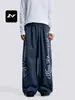 Marca de moda americana Estampado de letras Pantalones deportivos con cordón Hombres Mujeres Diseño holgado con puños Sentido del diseño Caída Casual Pantalones de pierna ancha