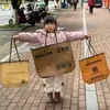 Bolsas de Tote No Tejidas Personalizadas, Bolsas de Regalo Publicitarias Ecológicas con Cordón, Bolsas de Empaque para Compras de Ropa para Tiendas de Ropa para Mujeres y Niños