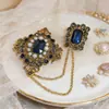 Nuevo Broche de Borla, Broche Personalizado Retro con Cadena y Piedra Esmeralda, Accesorios de Pin para Traje y Abrigo de Trinchera del Fabricante