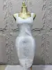 Europa y Estados Unidos transfronterizo sexy escote bajo cintura cadera sin mangas bronceado vendaje vestido moda atuendo caliente para fiesta