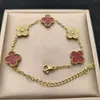 Comercio Exterior Venta Caliente Pulsera de Acero de Titanio con Incrustaciones de Diamantes Trébol de Cuatro Hojas Doble Cara Lujo Ligero Sensación de Alta Gama Joyería Popular de Nicho para Mujeres Fabricante