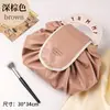 Bolsa de maquillaje portátil de gran capacidad, nuevo modelo 2024, bolsa de almacenamiento de cosméticos de viaje perezosa con cordón, organizador de mano