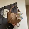 Bolso cruzado estilo coreano, Nuevo bolso de mano exquisito de lujo ligero para mujer, Nuevo bolso cubo 2026, Bolso de hombro simple y elegante